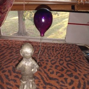 Pewter boy statue with glass balloon